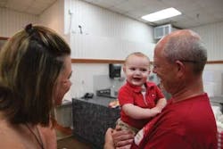 Isaac Chapman, 11 months old and living with CF, with his mother Crystal Ivey and friend Chip Merrill. Isaac Chapman, 11 months old and living with CF, with his mother Crystal Ivey and friend Chip Merrill.