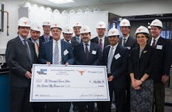 Baker Hughes presents a check to The University of Texas at Austin for additional research at three new Department of Petroleum and Geosystems Engineering labs. Baker Hughes presents a check to The University of Texas at Austin for additional research at three new Department of Petroleum and Geosystems Engineering labs.