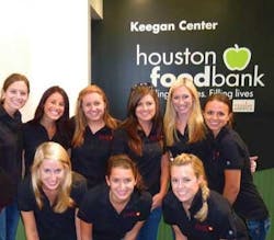 Swift volunteers at the Houston Food Bank. Swift volunteers at the Houston Food Bank.