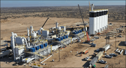 A dry sand plant is under construction in the Permian basin to reduce transport costs of sand. Massive driers on the left side of the photo dry the sand before it’s tightly screened and loaded into the adjacent towers to be handled at the wellsite (Fig 4). A dry sand plant is under construction in the Permian basin to reduce transport costs of sand. Massive driers on the left side of the photo dry the sand before it’s tightly screened and loaded into the adjacent towers to be handled at the wellsite (Fig 4).