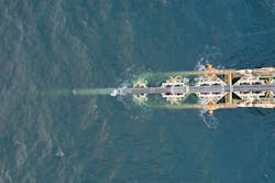 The pipeline can be seen from above as it is lowered from pipelay vessel Audacia's stinger and installed on the Baltic seafloor in German waters. The pipeline can be seen from above as it is lowered from pipelay vessel Audacia's stinger and installed on the Baltic seafloor in German waters.