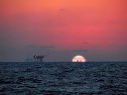 File photo: Oil rig at sunset, Gulf of Mexico.