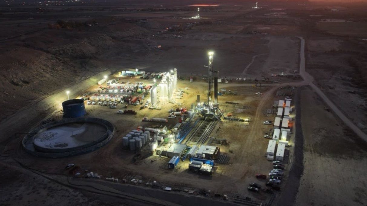 SM Energy Uinta drilling rigs at night.