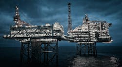 Offshore oil and gas platform at night Offshore oil and gas platform at night