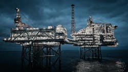Offshore oil and gas platform at night Offshore oil and gas platform at night