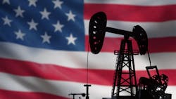 pumpjack over American flag pumpjack over American flag