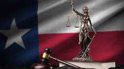 Texas US state flag with statue of lady justice