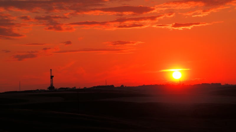 Sun down on an oil rig just outside Williston North Dakota.
