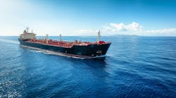 Aerial view of a heavy crude oil tanker traveling with speed over the ocean Aerial view of a heavy crude oil tanker traveling with speed over the ocean