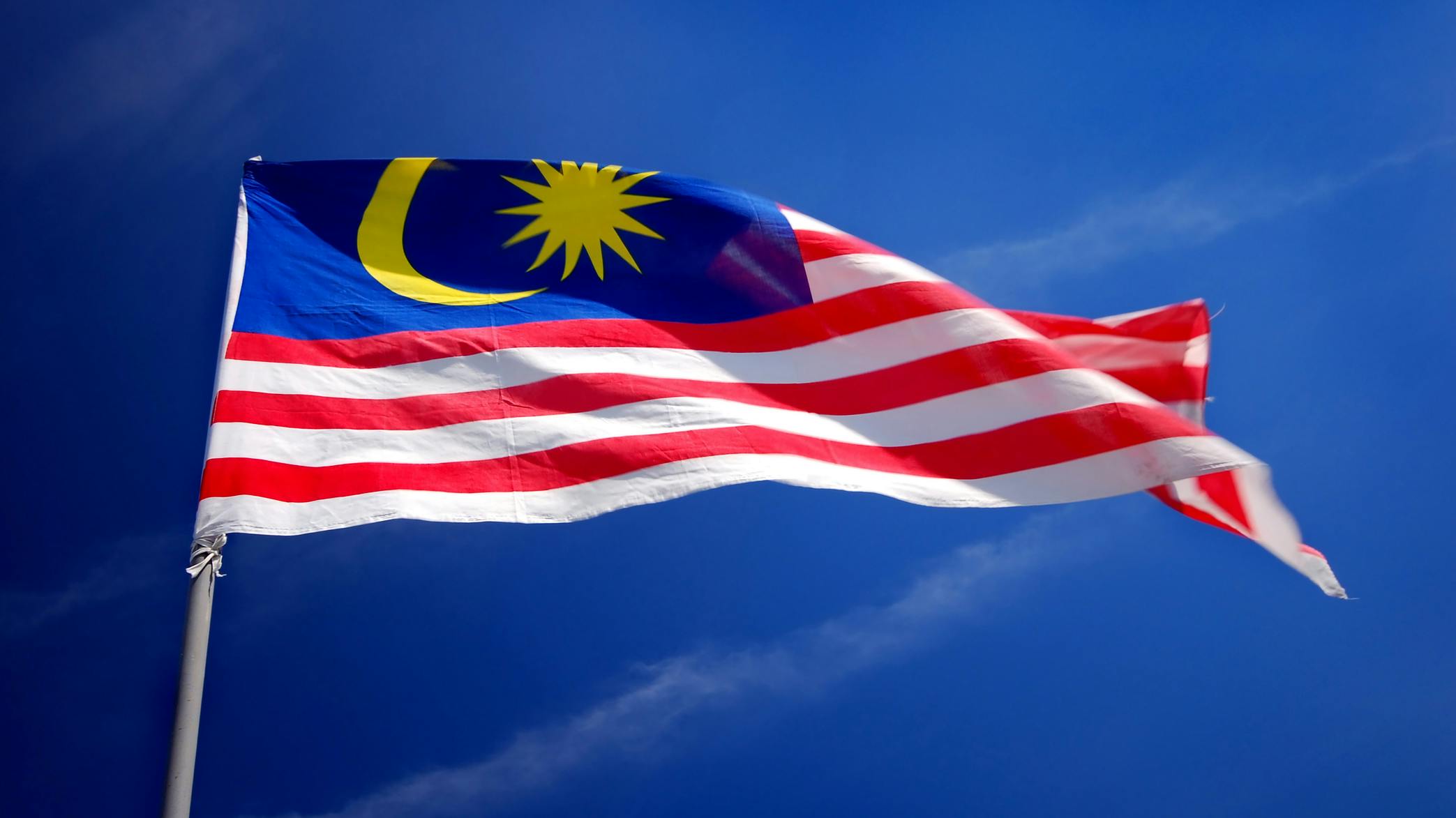 Malaysia's flag over blue sky