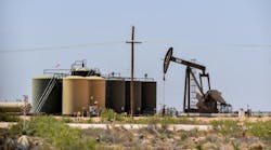 An oil and gas pumpjack in New Mexico. An oil and gas pumpjack in New Mexico.