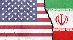 US and Iran flags painted on concrete with a break down the center US and Iran flags painted on concrete with a break down the center