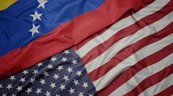 Split screen of Venezuela flag and US flag Split screen of Venezuela flag and US flag