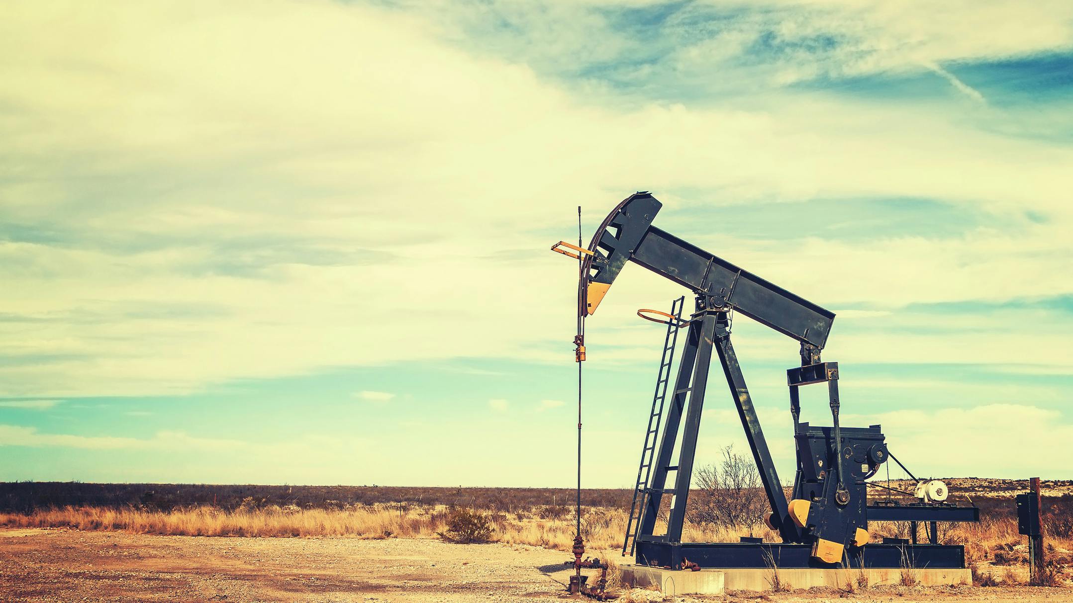 Vintage toned picture of an oil pump jack, Texas, US