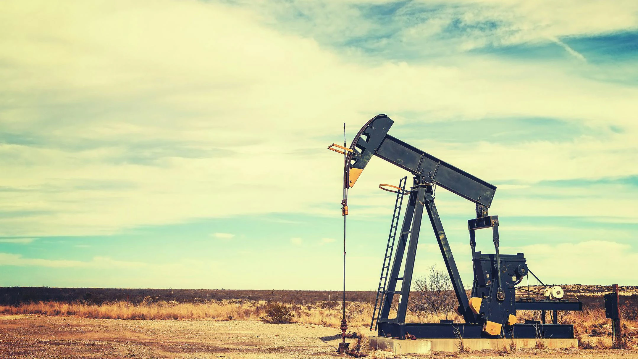 Vintage toned picture of an oil pump jack, Texas, US