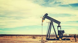 Vintage toned picture of an oil pump jack, Texas, US Vintage toned picture of an oil pump jack, Texas, US