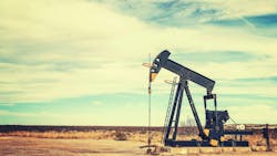 Vintage toned picture of an oil pump jack, Texas, US Vintage toned picture of an oil pump jack, Texas, US