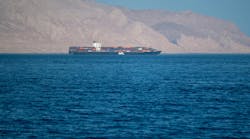 Sea container ship in the Strait of Hormuz, near Iranian coastline, 2021 Sea container ship in the Strait of Hormuz, near Iranian coastline, 2021