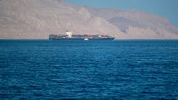 Sea container ship in the Strait of Hormuz, near Iranian coastline, 2021 Sea container ship in the Strait of Hormuz, near Iranian coastline, 2021