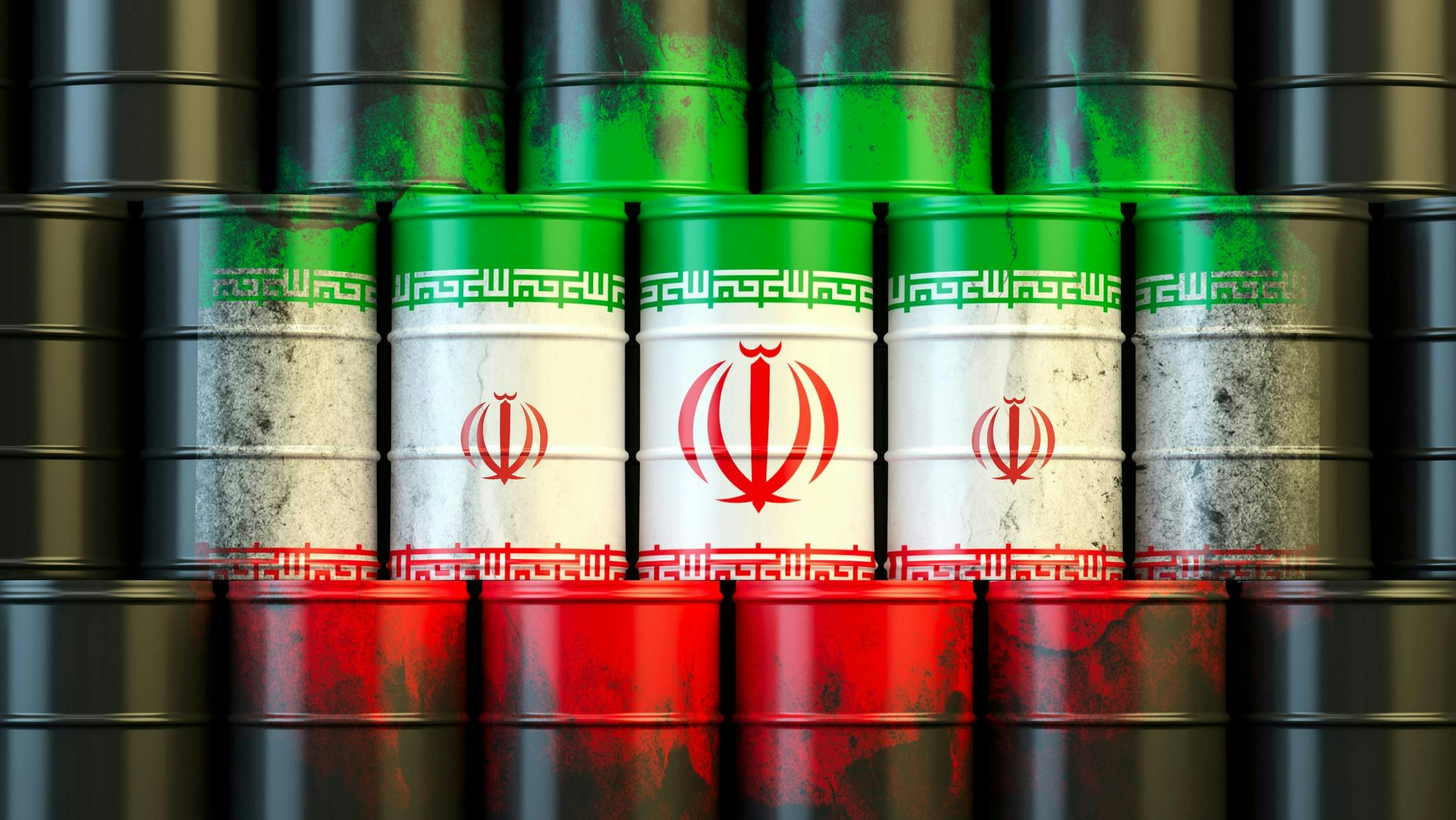 Stacked oil barrels painted with the colors and emblem of the Iranian flag