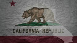 California flag and outline map of California on paper texture background California flag and outline map of California on paper texture background