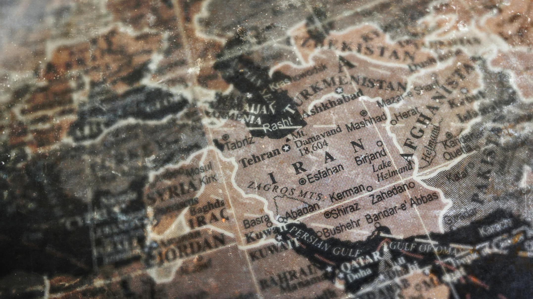 Iran map on vintage crack paper background