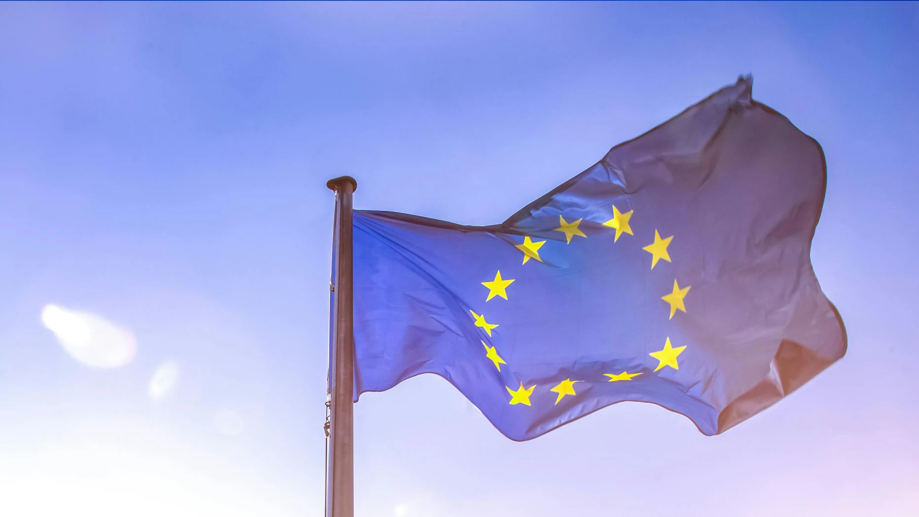 European flag on bright blue sly background