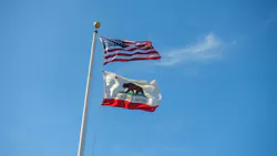 California Republic and American flags are waving. California Republic and American flags are waving.