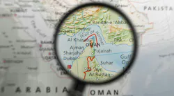 Map of Strait of Hormuz and surrounding area under magnifying glass Map of Strait of Hormuz and surrounding area under magnifying glass