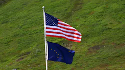 United States and Alaska flags blowing in a breeze. United States and Alaska flags blowing in a breeze.
