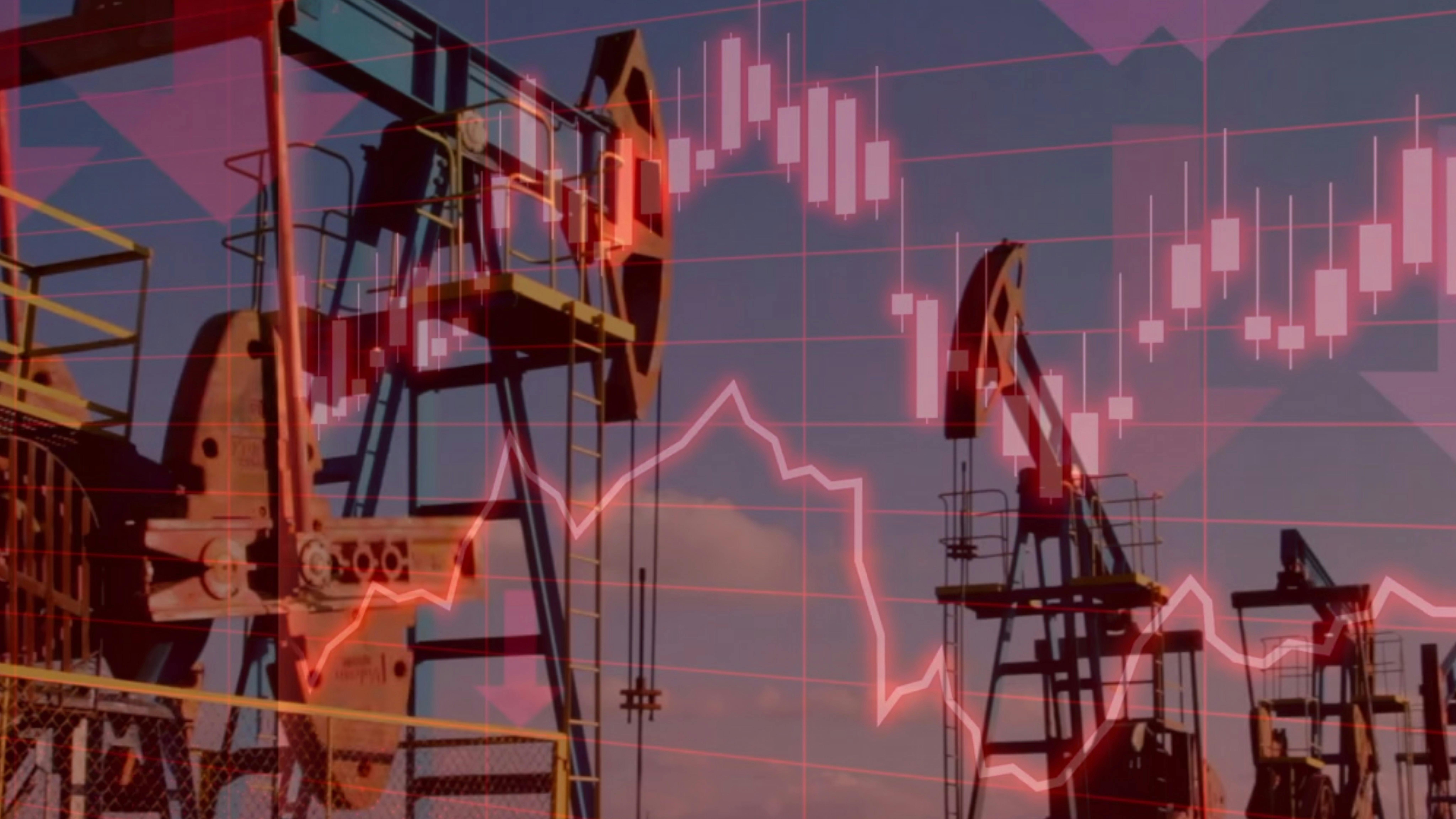 Silhouettes of industrial oil pump jacks operating at sunset, overlaid with red downward-trending lines and stock market charts