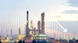 Oil gas refining-petrochemical complex with downward trending arrow on chart in background Oil gas refining-petrochemical complex with downward trending arrow on chart in background