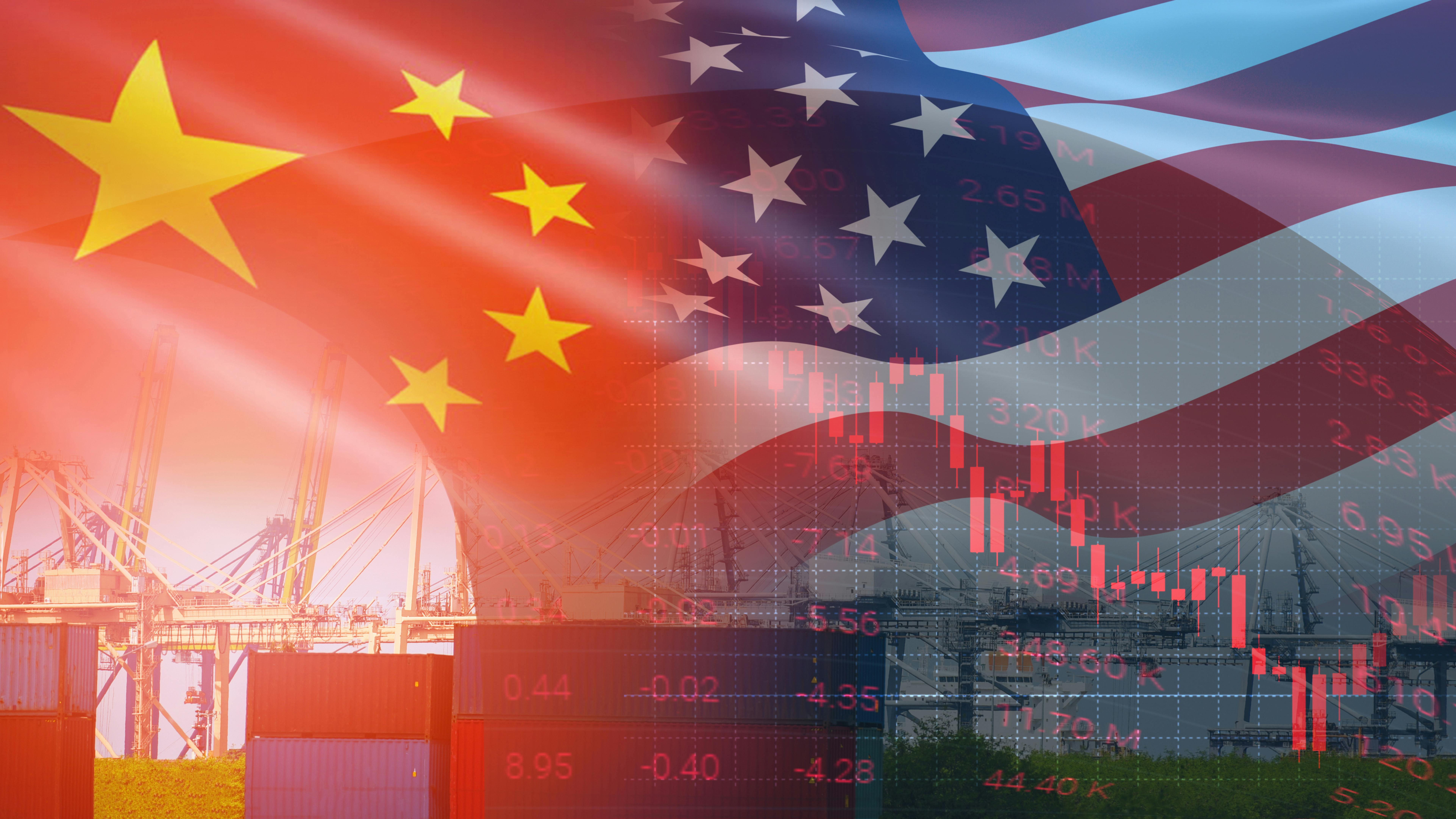 USA, China flags with container ship and financial chart background