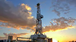 Drilling rig at sunset Drilling rig at sunset