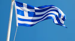 Greece flag waving in front of a blue sky Greece flag waving in front of a blue sky
