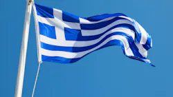 Greece flag waving in front of a blue sky Greece flag waving in front of a blue sky