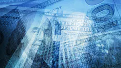 US currency with office buildings on blue background US currency with office buildings on blue background