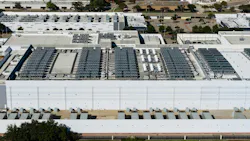 Data center building roof with cooling units generating computing power