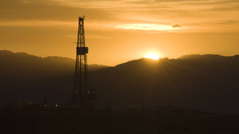 Drilling rig at sunset