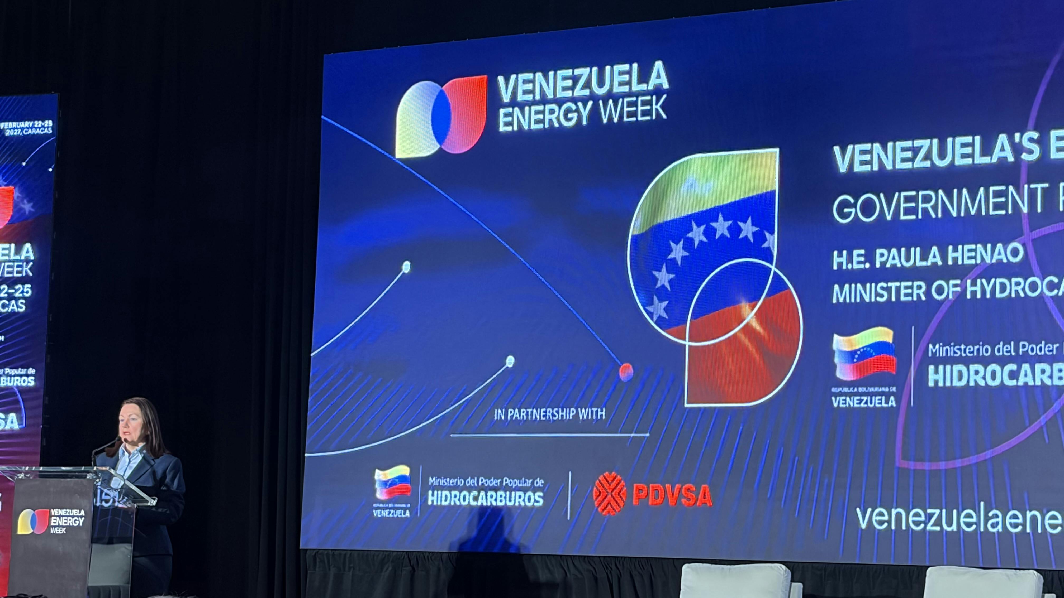 A person at a podium speaking at an energy conference.
