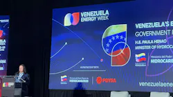 A person at a podium speaking at an energy conference.
