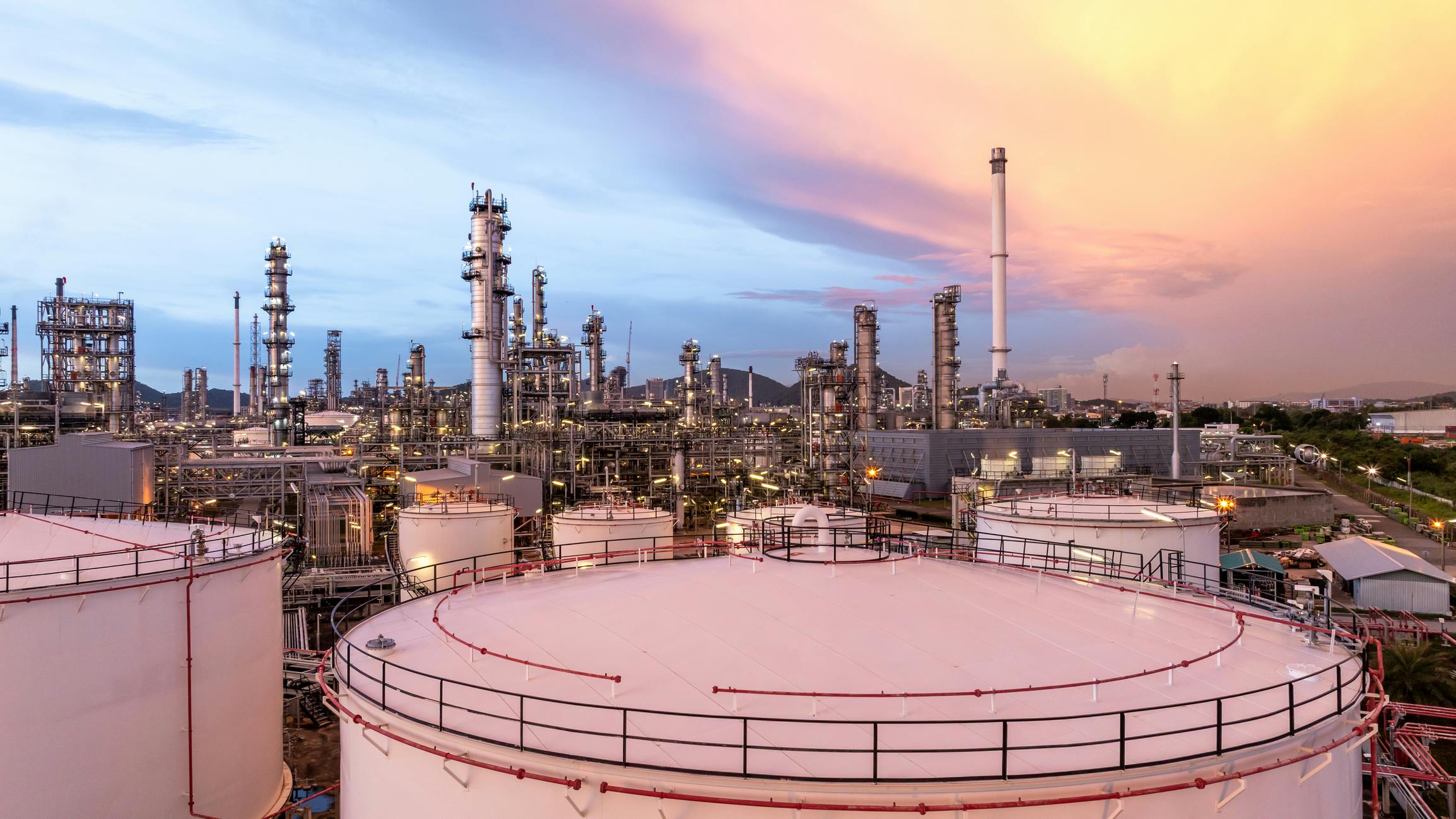 Aerial view oil and gas refinery plant at night.
