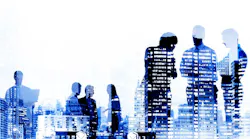 Office workers in silhouette against office buildings background