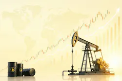 An image showing a drilling rig and oil barrels.
