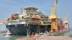 FPSO docked at a shipyard in Singapore.