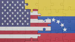 US and Venezuela flags composed through puzzle pieces.