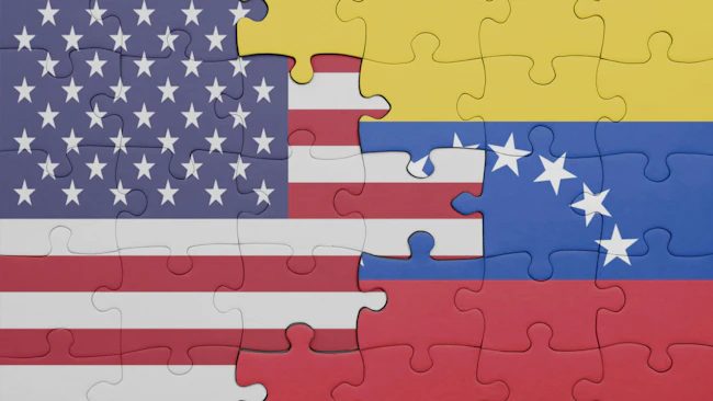 US and Venezuela flags depicted in puzzle pieces intertwined