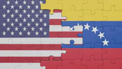 US and Venezuela flags depicted in puzzle pieces intertwined