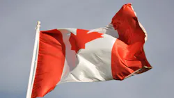 Canadian flag waving in wind
